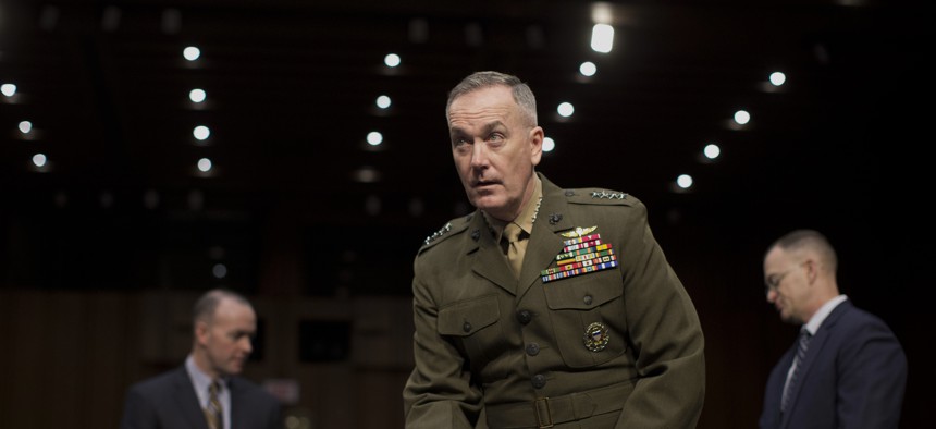 Marine Gen. Joseph F. Dunford, Jr., Commander, International Security Assistance Force, arrives on Capitol Hill in Washington, Wednesday, March 12, 2014, to testify before the Senate Armed Services Committee on the situation in Afghanistan.