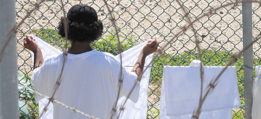 A detainee hangs his laundry in the recreation area of Camp Four at Joint Task Force Guantanamo in a 2010 photo.