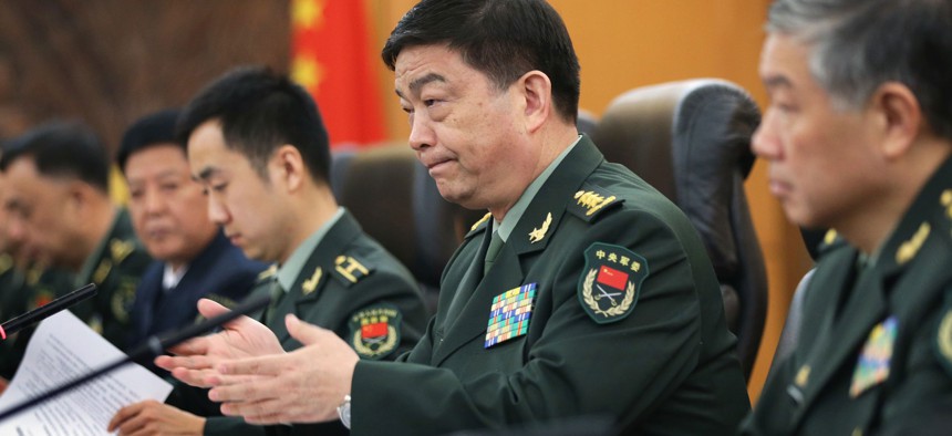 Chinese Minister of Defense Chang Wanquan gestures during a meeting with then-US Defense Secretary Hagel, April 8, 2014, at the Chinese Defense Ministry in Beijing, China.