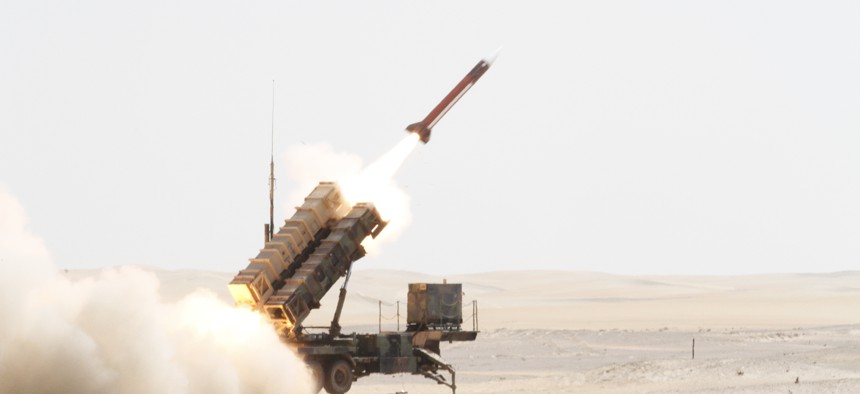 A Patriot missile is launched by Soldiers from C-Battery, 3rd Battalion (Airborne), 4th Air Defense Field Artillery Regiment, 108th Air Defense Artillery Brigade, at an airborne target during a joint live-fire exercise held Oct. 1, 2014.