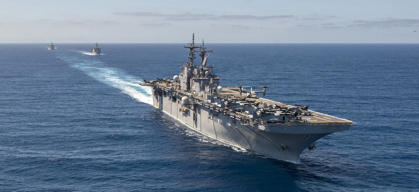 The USS Essex, USS Rushmore and USS Anchorage conduct a simulated strait transit, on March 23, 2015