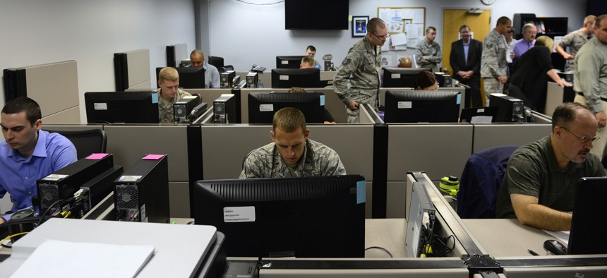 Students of the Network War Bridge Course participate in a class exercise conducted by the 39th Information Operations Squadron, Hurlburt Field, Fla., Sept. 19, 2014.