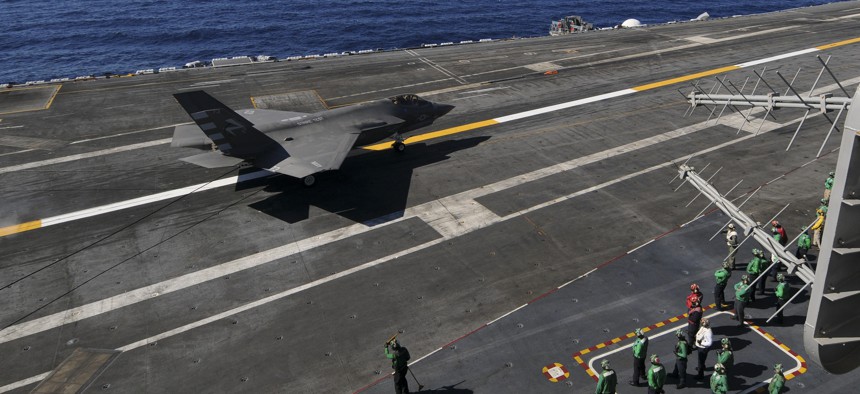 An F-35C Lightning II carrier variant Joint Strike Fighter conducts it’s first arrested landing aboard the aircraft carrier USS Nimitz (CVN 68).