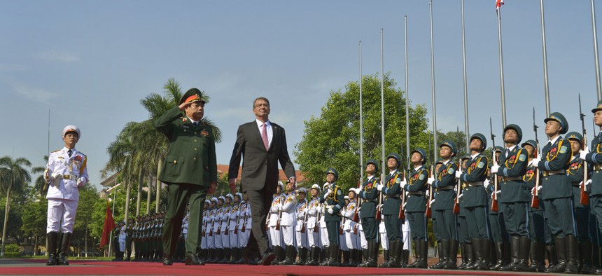 Secretary of Defense Ash Carter is welcomed with an honor cordon by Vietnamese Minister of Defense General Phung Quang Thanh n Hanoi, Vietnam, June 1, 2015.