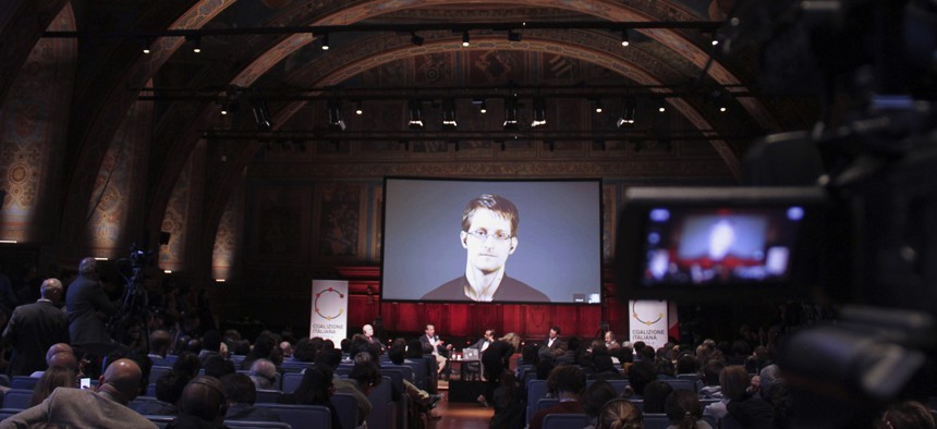 National Security Agency leaker Edward Snowden appears on a live video as he attends a International Journalism Festival panel via Skype, on April 17, 2015.