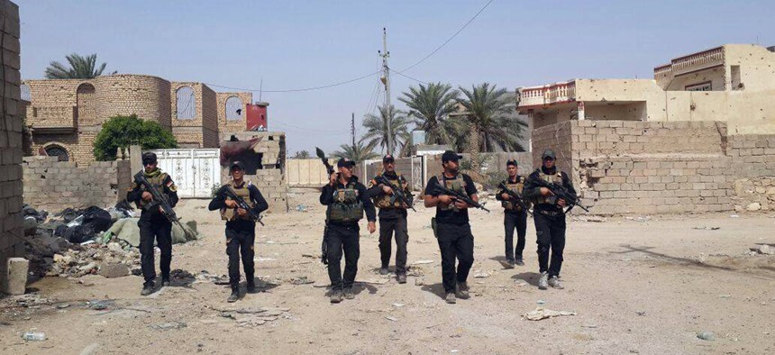 Iraqi anti-terrorism forces patrol in Ramadi, Iraq, Saturday, April 18, 2015. 