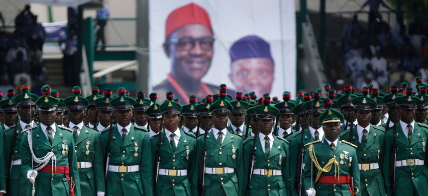 Nigeria Soldiers parade during the inauguration of the new Nigerian President, Muhammadu Buhari, in Abuja , Nigeria, Friday, May 29, 2015. 