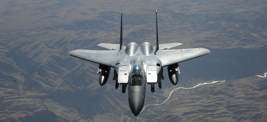 A U.S. Air Force F-15E Strike Eagle fighter aircraft flies over the skies of Afghanistan on July 30, 2011. 