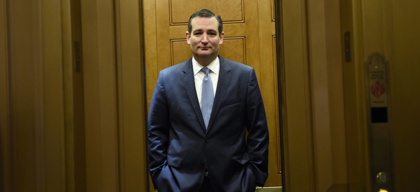 Republican presidential candidate, Sen. Ted Cruz, R-Texas, gets on an elevator on Capitol Hill in Washington, Thursday, June 4, 2015.