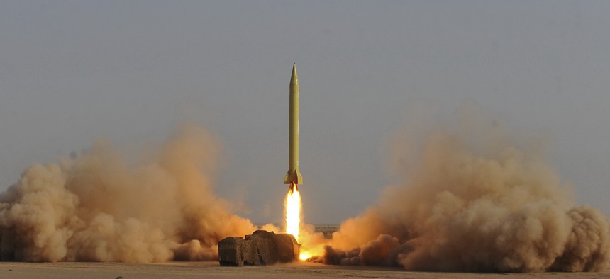 An Iranian Shahab-3 missile is launched during military maneuvers outside the city of Qom, Iran, Tuesday, June 28, 2011. 