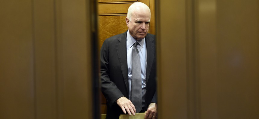 Sen. John McCain, R-Ariz., gets on an elevator after being on the Senate floor on Capitol Hill in Washington, Thursday, June 4, 2015.