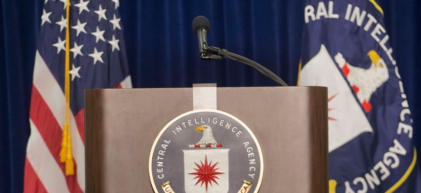 The stage and podium are seen set up before the start of CIA Director John Brennan's news conference at CIA headquarters in Langley, Va., Thursday, Dec. 11, 2014. 
