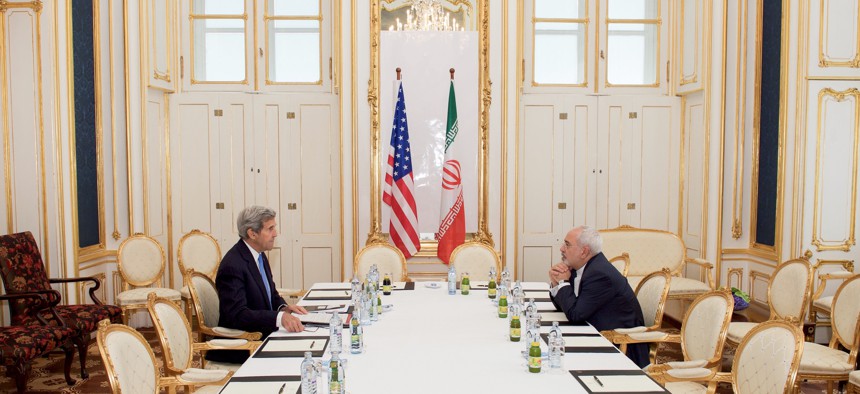 Secretary of State John Kerry negotiates a deal with Iranian foreign minister Javad Zarif. 