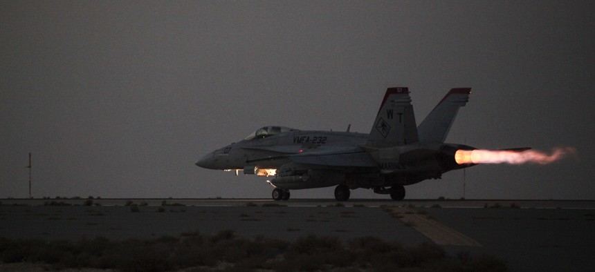 A U.S. Marine Corps F/A-18 Hornet launches for a strike mission in Southwest Asia, June 10, 2015. 