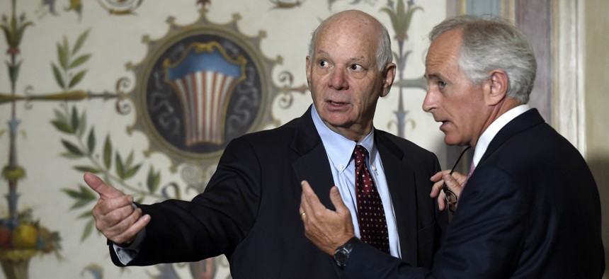 Senate Foreign Relations Committee Chairman Sen. Bob Corker, R-Tenn., right, talks with the committee's ranking member Sen. Ben Cardin, D-Md. on Capitol Hill in Washington, Thursday, July 16, 2015.