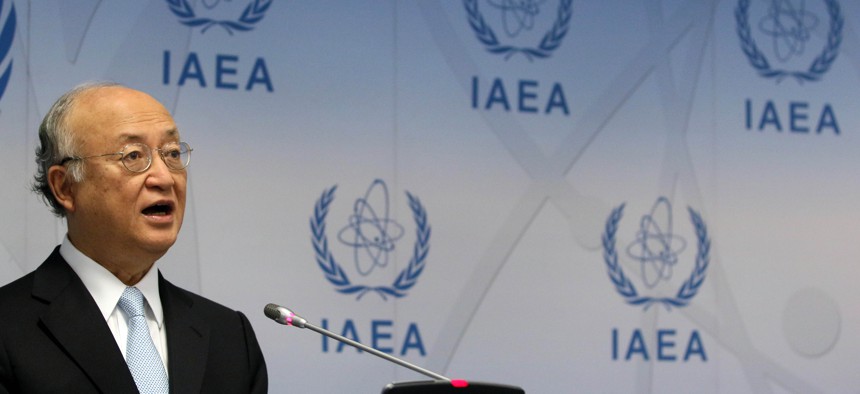 Director General of the International Atomic Energy Agency, IAEA, Yukiya Amano of Japan addresses the media during a news conference after a meeting of the IAEA board of governors at the International Center in Vienna, Austria, Monday June 8, 2015.
