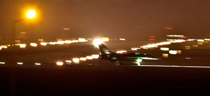 A Turkish fighter jets taxies on the runway after a night landing at the Incirlik airbase, southern Turkey, Aug. 31, 2013. 