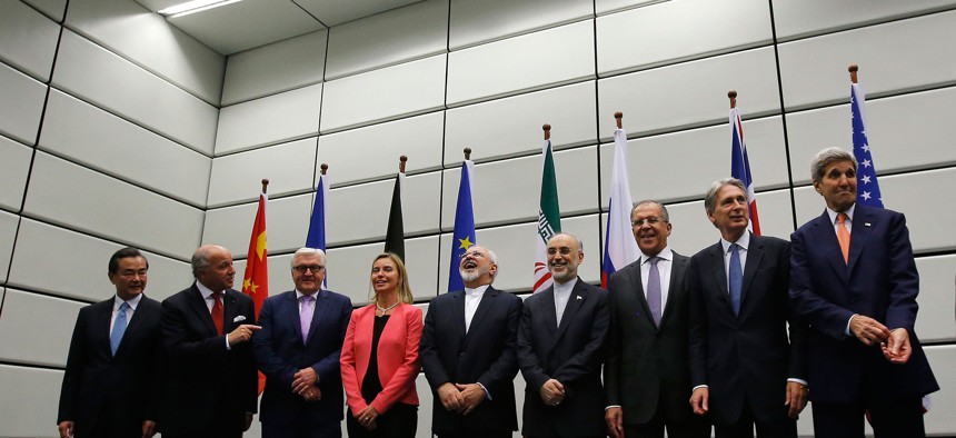 The Iran nuclear deal negotiating parties pose for a group photo at the United Nations building in Vienna, Austria, Tuesday July 14, 2015. 