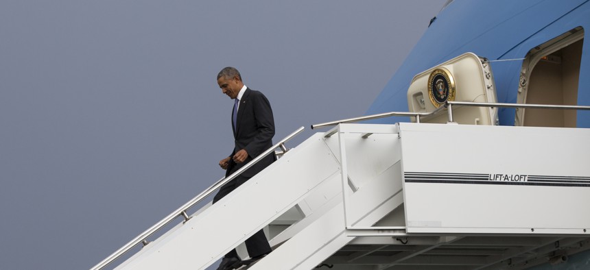 President Barack Obama walks down the steps of Air Force One as he arrives at Addis Ababa Bole International Airport, on Sunday, July 26, 2015, in Addis Ababa. 
