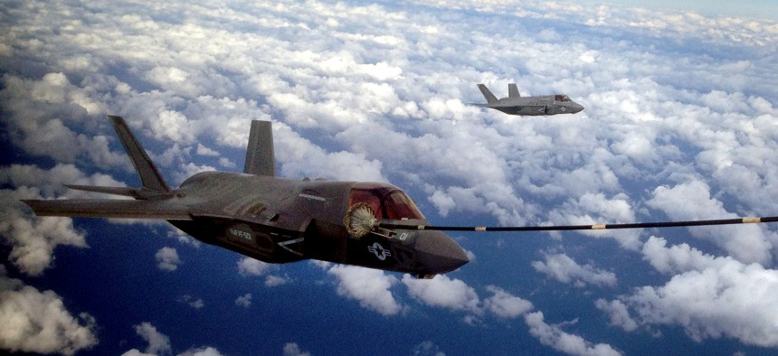 Two F-35B Joint Strike Fighters conduct the first aerial refueling of its kind with a KC-130J Hercules in the sky above Eglin Air Force Base, Fla., Oct. 2. 2012. 