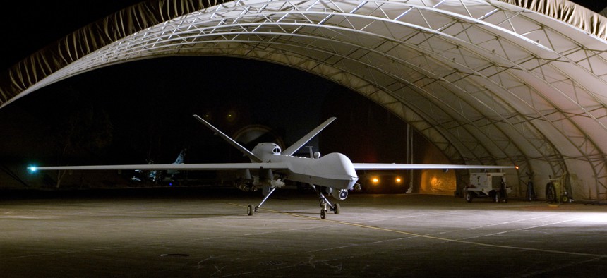 An MQ-9 Reaper remotely piloted aircraft prepares to taxi out of a hangar, Aug. 8, 2008. 