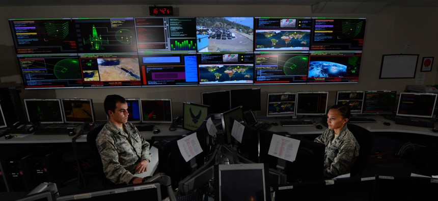 U.S. Airmen at the Global Strategic Warning and Space Surveillance System Center at Cheyenne Mountain Air Force Station, Colo., Sept. 2, 2014.