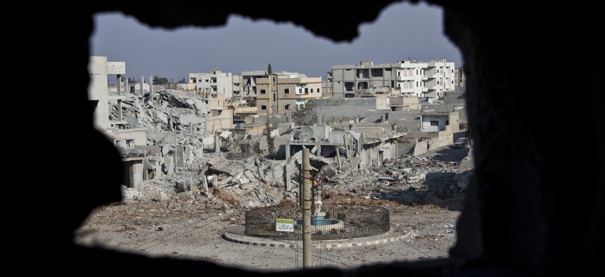 A 2014 photo of rubble in Kobani, Syria, where the town's defenders clashed with ISIS. 