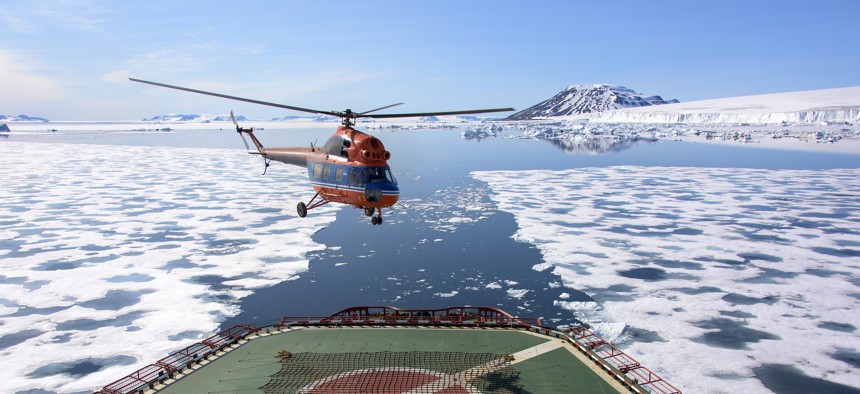 A helicopter lifts off the deck of the Russian nuclear-powered icebreaker 50 Years of Victory in the Arctic Sea on July 5, 2015. Used under Creative Commons Attribution 2.0 Generic.