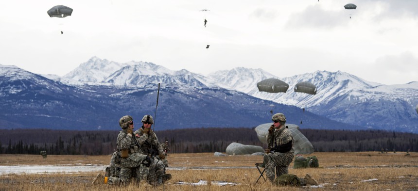 Paratroopers with the 25th Infantry Division establish communications during an exercise at Joint Base Elmendorf-Richardson, Alaska, on March 18, 2015.
