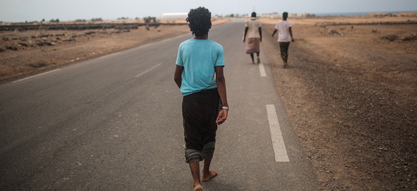 Yemeni refugee trek from their camp to the center of Obock city, northern Djibouti, May 20, 2015. 