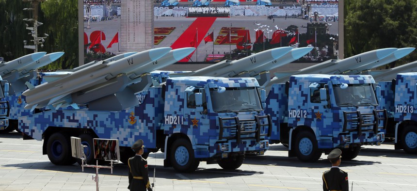 Military vehicles carry YJ anti-ship cruise missiles during a parade with more than 500 pieces of military hardware and 200 aircraft of various types, representing what military officials say is the Chinese military's most cutting-edge technology.