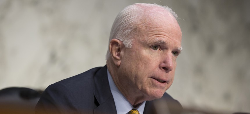 Senate Armed Services Committee Chairman Sen. John McCain, R-Ariz. questions former CIA Director David Petraeus during the committee's hearing on Middle East policy, Tuesday, Sept. 22, 2015, on Capitol Hill in Washington.