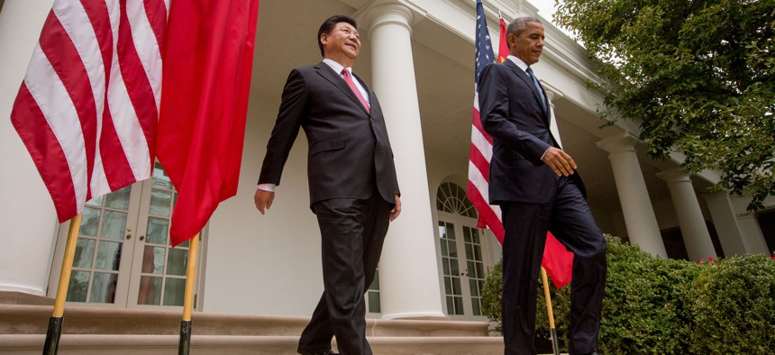 President Barack Obama and Chinese President Xi Jinping arrive for their joint news conference, Friday, Sept. 25, 2015, in the Rose Garden at the White House in Washington.
