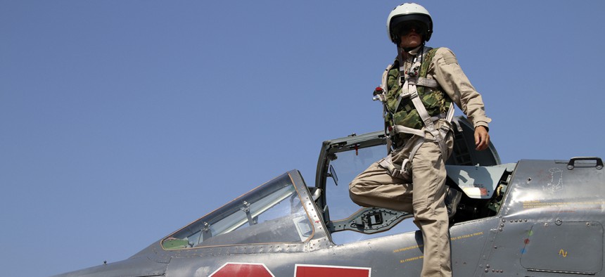 A Russian pilot in his SU-25M fighter at Hmeimim airbase in Syria, Saturday, Oct. 3. Russian forces would escalate attacks in Syria the following week.