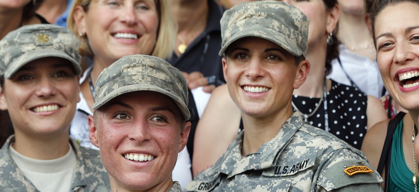 U.S. Army First Lt. Shaye Haver, center, and Capt. Kristen Griest, right, at Ranger school graduation, Aug. 21, 2015.