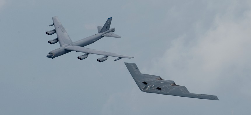 BARKSDALE AFB, La. -- A B-2 and B-52 fly in formation over Shreveport, La., on May 10 during the Defenders of Liberty Airshow and Open House.