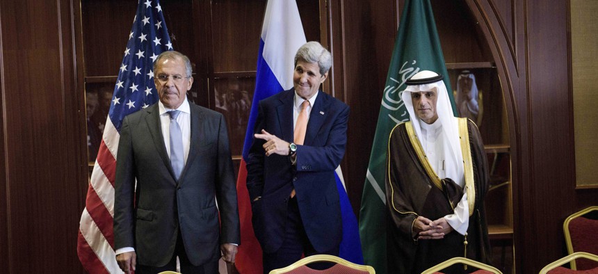 n this Monday Aug. 3, 2015 file photo, Russia's Foreign Minister Sergey Lavrov, from left, U.S. Secretary of State John Kerry and Saudi Foreign Minister Adel al-Jubeir stand together before a trilateral meeting in Doha, Qatar.