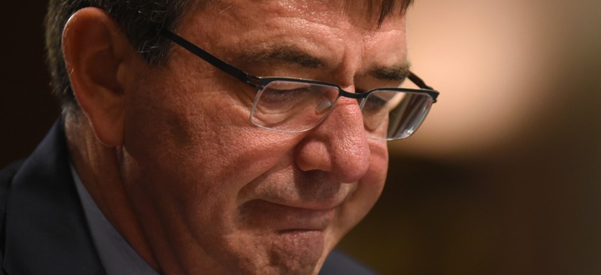 Defense Secretary Ash Carter pauses while testifying on Capitol Hill in Washington, Tuesday, Oct. 27, 2015, before the Senate Armed Services Committee.