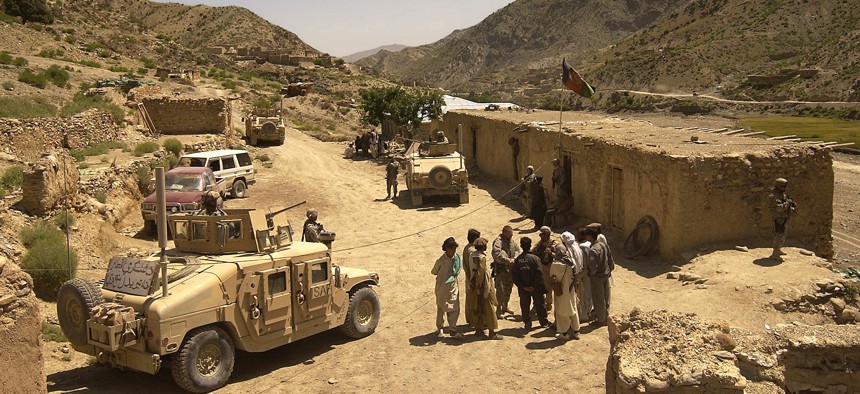 A convoy from the Khowst Provincial Reconstruction Team visits a district center in the Spera District of Khowst Province, Afghanistan, May 17, 2007. The team members visited Spera to assess the areaís security situation.