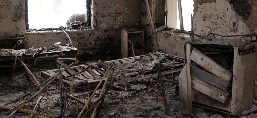 In this Friday, Oct. 16, 2015 photo, the charred remains of the Doctors Without Borders hospital is seen after it was hit by a U.S. airstrike in Kunduz, Afghanistan.