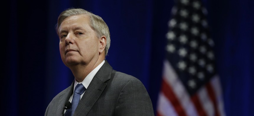 Republican presidential candidate, U.S. Senator Lindsey Graham, R-SC, pauses during his remarks at the Sunshine Summit in Orlando, Fla., Friday Nov. 13, 2015.