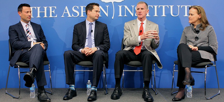 Retired Gen. Stanley McChrystal, center right, at a panel discussion on national service with Rep. Seth Moulton (center left) and Michele Flournoy (right) of the Center for a New American Security. Kevin Baron, far left, of Defense One moderated.