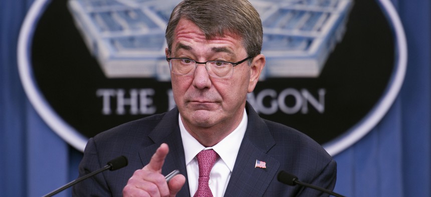 Defense Secretary Ash Carter gestures during a news conference at the Pentagon, Thursday, Dec. 3, 2015, to announce that he has ordered the military to open all combat jobs to women.
