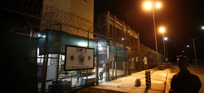 In this image reviewed by the U.S. military, the entrance to Camp VI detention facility is guarded at Guantanamo Bay Naval Base, Cuba, Wednesday, Nov. 20, 2013.