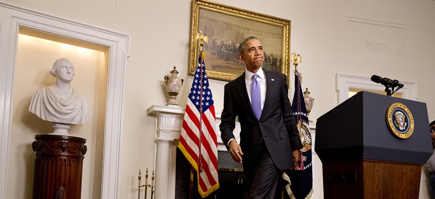 President Barack Obama leaves the podium after speaking about the release of Americans by Iran, Sunday, Jan. 17, 2016, in the Cabinet Room of the White House in Washington.