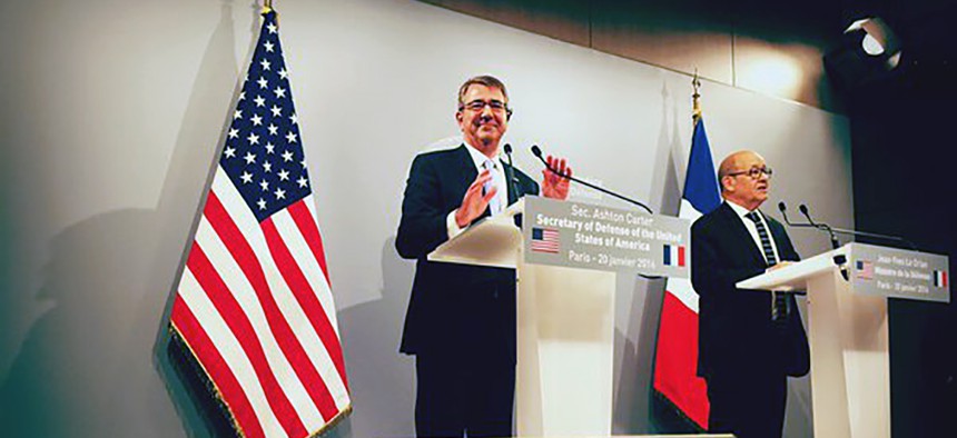 French Defense Minister Jean-Yves Le Drian, right, and U.S. Secretary of Defense Ash Carter speak to the press at the Defense Ministry in Paris on Jan. 20, 2016.