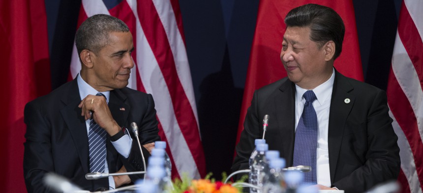 President Barack Obama, left, meets with Chinese President Xi Jinping during the COP21, United Nations Climate Change Conference, in Le Bourget, outside Paris, on Monday, Nov. 30, 2015.