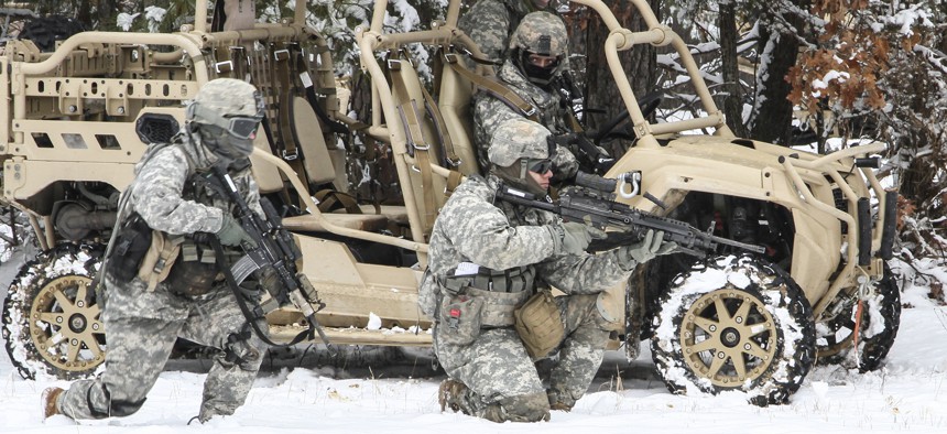 U.S. Army paratroopers assigned to 82nd Airborne Division practice a tactical halt with their brigade’s new Light Tactical All Terrain Vehicle on Fort Pickett, Va., on Feb. 26, 2015.