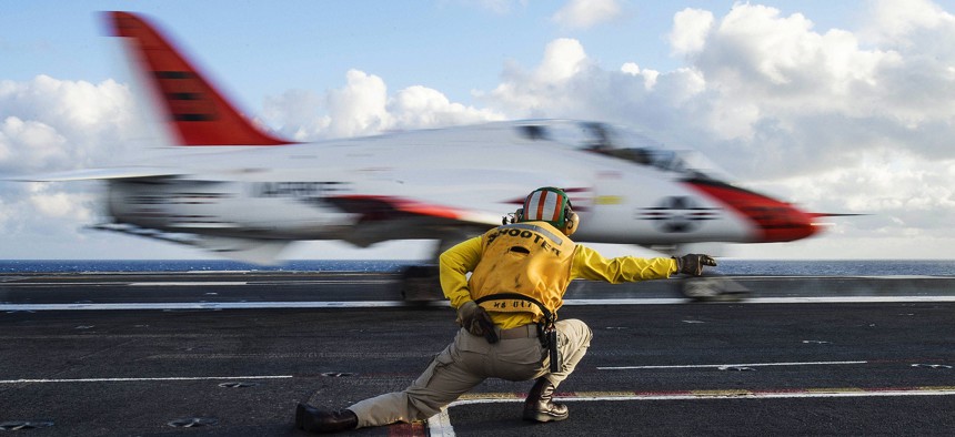 A T-45C Goshawk launches from the aircraft carrier USS Dwight D. Eisenhower, preparing for qualifications in the Atlantic Ocean, Feb. 3, 2016.