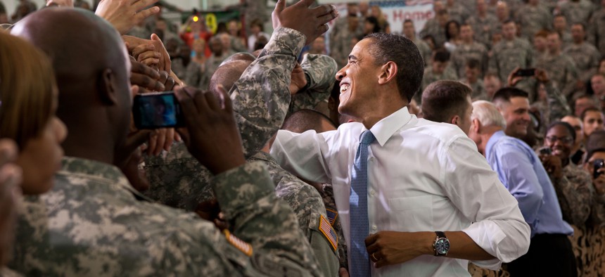 President Barack Obama and Vice President Joe Biden shake hands with the troops following the President's remarks at Fort Campbell, Ky., May 6, 2011. 